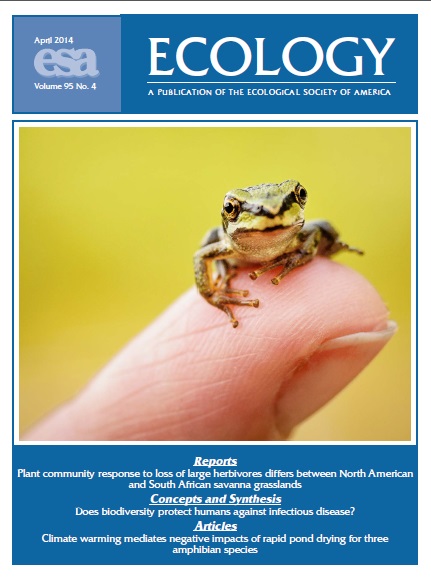 Ecology April cover shows a small fron on the tip of a human finger.