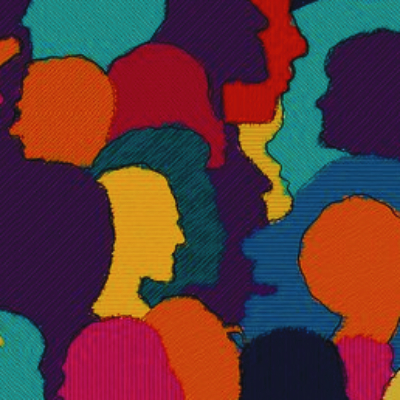A pastiche of multicolored human faces in silhouette to represent human diversity